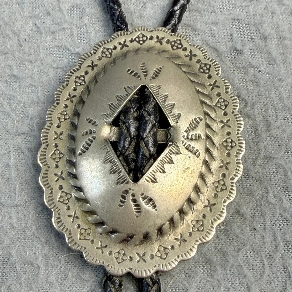 Vintage Western Bolo Tie Silver Tone Stamped Concho Black Braided Cord Cowboy